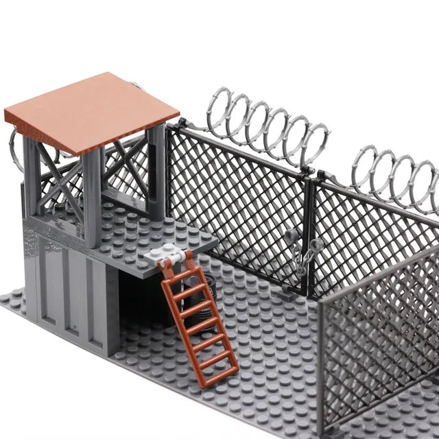 Guard Tower with Barbed Wire Fence